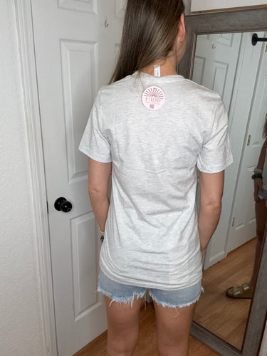 She Loves Jesus Graphic Tee- Festivities